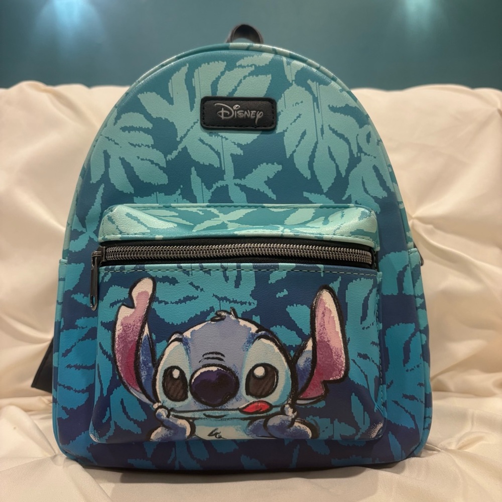 SALE Loungefly EXCLUSIVE Disney Stitch Tropical Mini Backpack
Lilo & Stitch NWOT